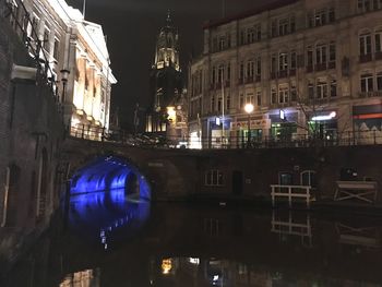 Reflection of illuminated buildings in water