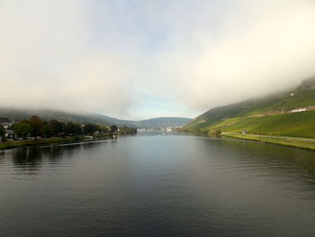 Scenic view of river against sky