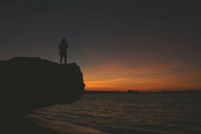 Scenic view of sea at sunset