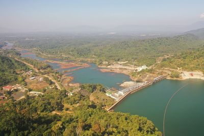 High angle view of river amidst landscape against sky