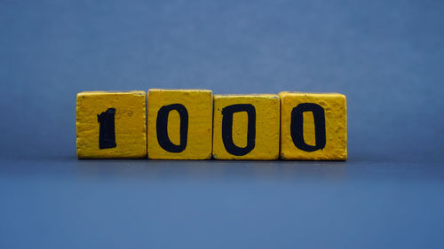 Close-up of toy blocks on blue background