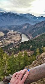 Scenic view of landscape against mountain range