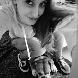 Portrait of woman with dog