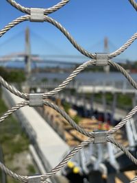 Bridge through a fence