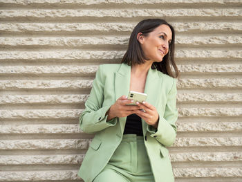 Young woman using mobile phone