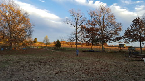 Scenic view of landscape against cloudy sky