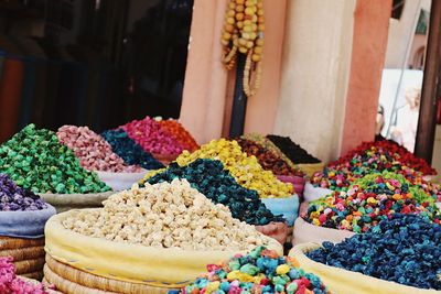 Multi colored food for sale at market stall