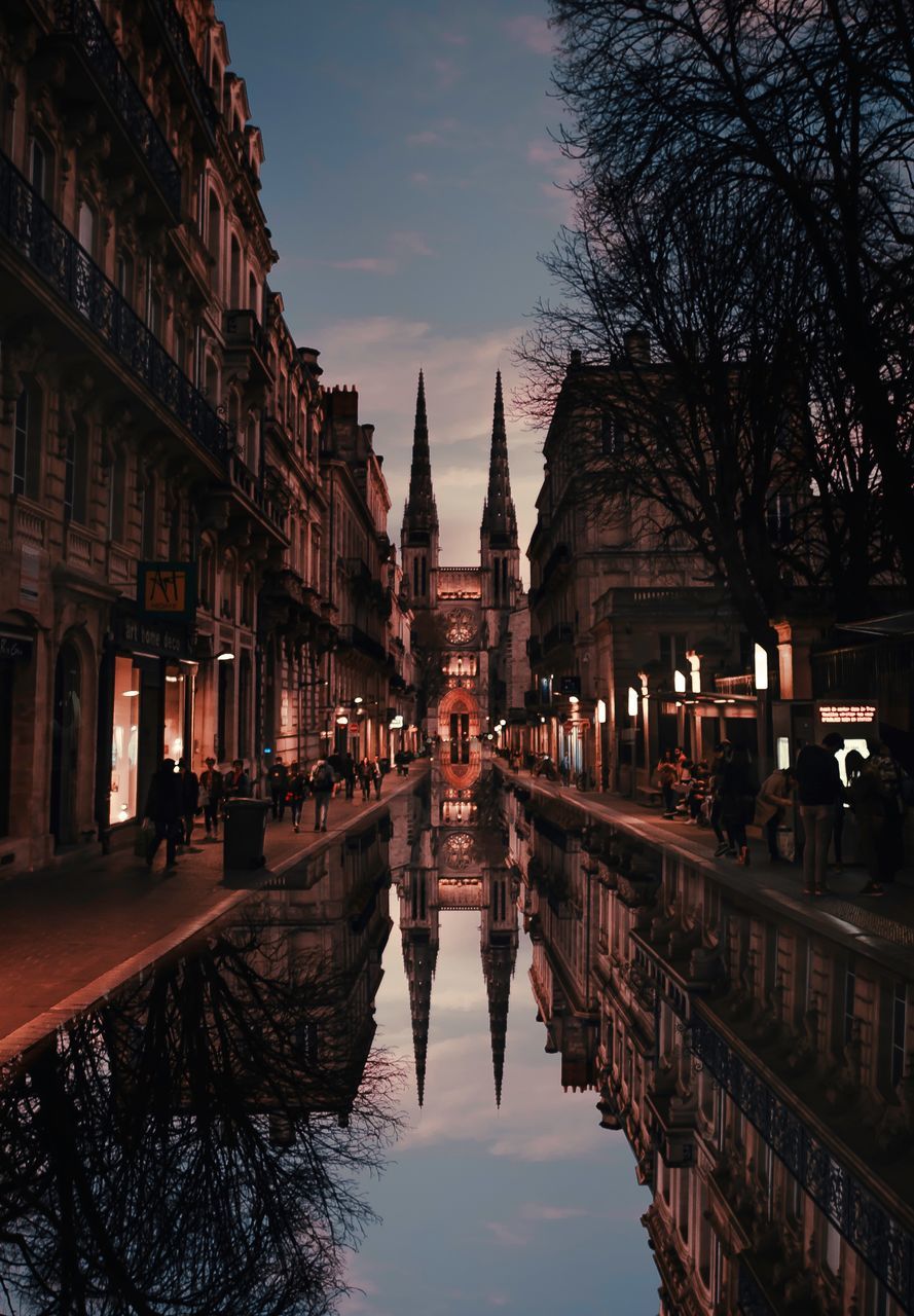 REFLECTION OF ILLUMINATED BUILDINGS IN CANAL