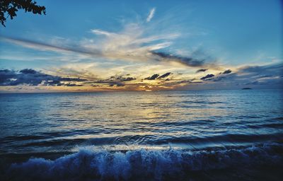 Scenic view of sea against sky at sunset