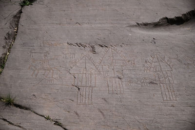 High angle view of text on wood