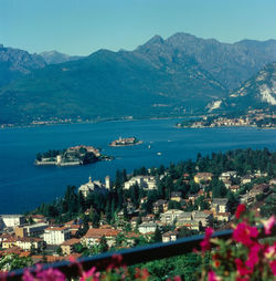 High angle view of townscape by sea