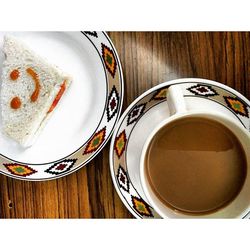 Close-up of coffee cup on table