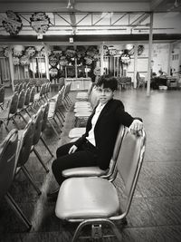 Woman sitting in chair