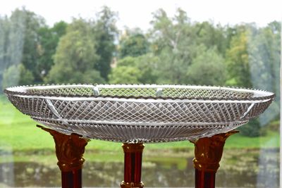 Close-up of wicker basket on field