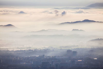 High angle view of townscape against sky during sunset