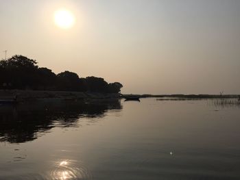 Scenic view of sunset over river