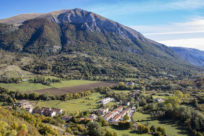 Scenic view of landscape and mountains against sky