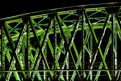 Low angle view of metal structure against sky