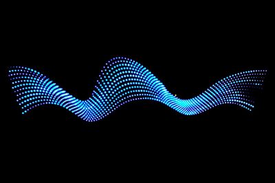 Close-up of abstract over black background