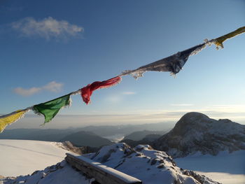 Scenic view of snow covered mountain against sky