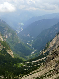 Aerial view of valley and mountains against sky