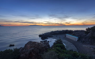 High angle view of sea against sky during sunset