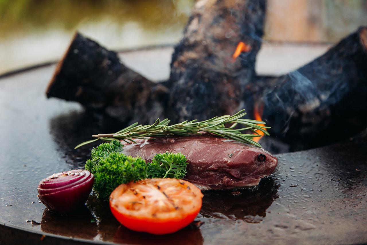 food, food and drink, meat, freshness, fire - natural phenomenon, heat - temperature, burning, focus on foreground, close-up, fire, no people, still life, preparing food, preparation, ready-to-eat, flame, healthy eating, wood - material, indoors, herb, beef, temptation