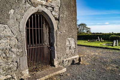Window on old building against sky