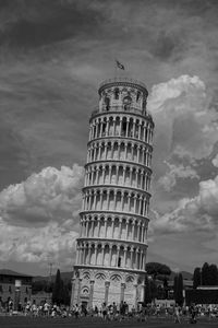 Low angle view of historical building against cloudy sky