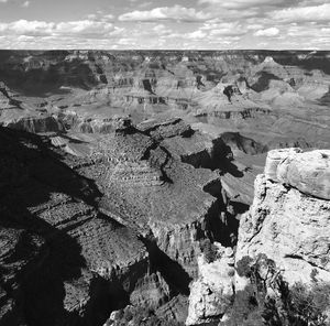 High angle view of rocks on landscape against sky