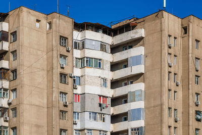 Low angle view of building against clear blue sky