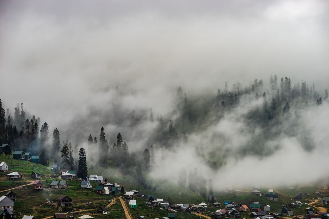 fog, environment, landscape, mountain, nature, sky, cloud, scenics - nature, beauty in nature, plant, tree, land, travel, travel destinations, architecture, tourism, outdoors, social issues, no people, forest, mountain range, morning, high angle view, built structure, activity, mist