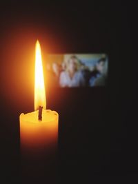 Close-up of illuminated candle