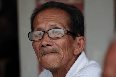 Close-up portrait of senior man