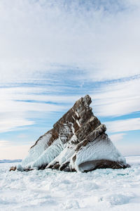 Scenic view of frozen lake against sky