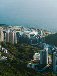 High angle view of townscape by sea