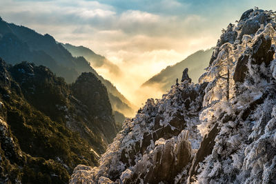 Scenic view of mountains against sky during sunset