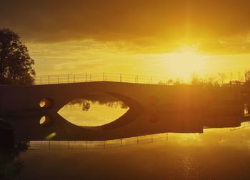 Bridge against sky during sunset