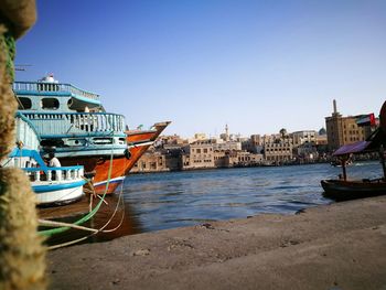 Boats moored in sea