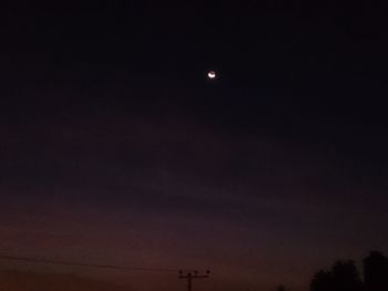 Low angle view of moon in sky