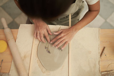 High angle view of man working on table