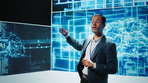 Portrait of businessman using digital tablet in office