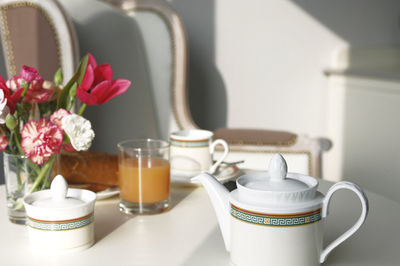 Close-up of coffe and tea served on table