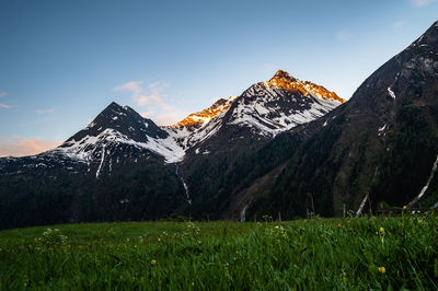 Scenic view of snowcapped mountains against sky