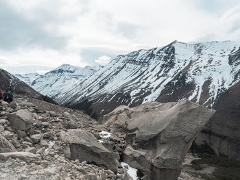 Scenic view of snow covered mountains against sky