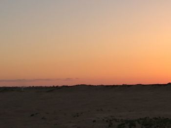 Scenic view of silhouette landscape against sky during sunset