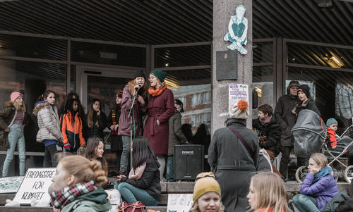 Group of people in front of building in winter