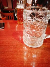 Close-up of beer in glass on table