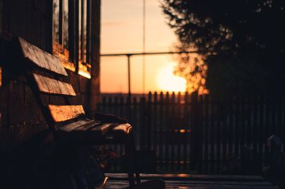 Rear view of man sitting on street