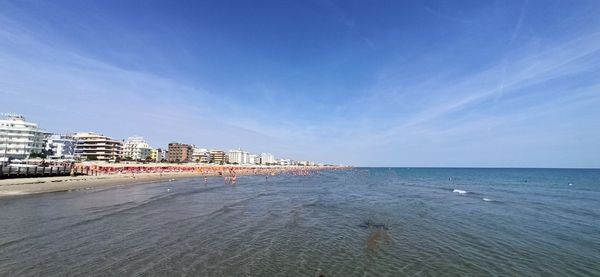 Scenic view of sea against blue sky